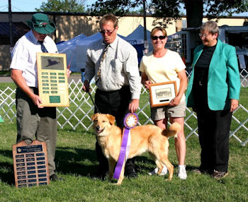 Finnigan standing, and behind him from left to 
right, the Honorable Judge Patrick O'Connell, Dave Schiller, Karen Schiller 
and Joyce Maley